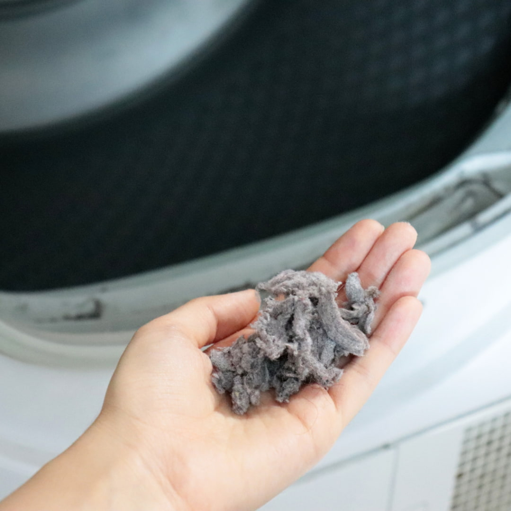Nettoyage du filtre à peluches d'un sèche linge